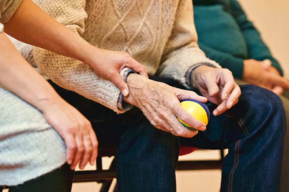 person holding a stress ball